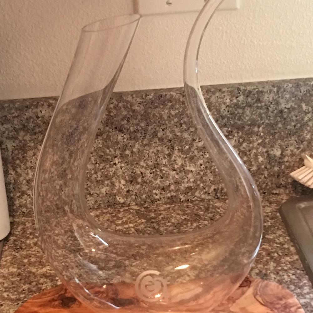 Beautiful wine decanter with wood cheese block